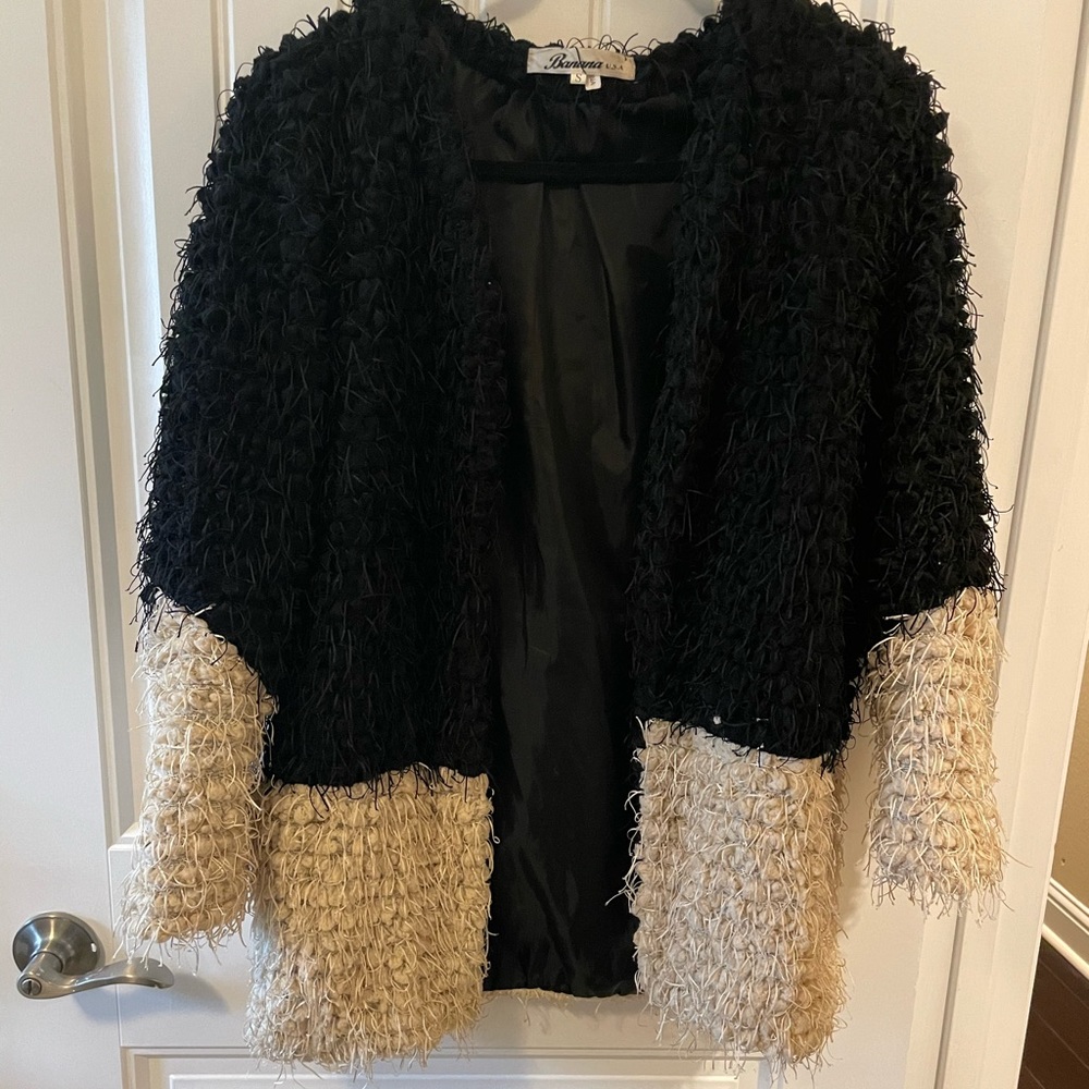 Black and Cream color block boutique shag jacket. Size S.